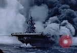 Image of burning American aircraft carrier Japan, 1945, second 42 stock footage video 65675029824