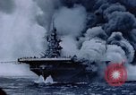 Image of burning American aircraft carrier Japan, 1945, second 43 stock footage video 65675029824