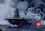 Image of burning American aircraft carrier Japan, 1945, second 44 stock footage video 65675029824