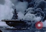 Image of burning American aircraft carrier Japan, 1945, second 46 stock footage video 65675029824