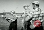 Image of carp fishing contest Michigan United States USA, 1956, second 14 stock footage video 65675029895