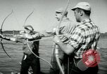 Image of carp fishing contest Michigan United States USA, 1956, second 15 stock footage video 65675029895