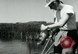 Image of carp fishing contest Michigan United States USA, 1956, second 22 stock footage video 65675029895