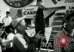 Image of carp fishing contest Michigan United States USA, 1956, second 32 stock footage video 65675029895