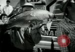 Image of carp fishing contest Michigan United States USA, 1956, second 34 stock footage video 65675029895