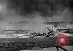 Standbild zerstörte Flugzeuge nach Angriff Pearl Harbor Hawaii USA, 1941, aus Sekunde 3 historischem Filmmaterial Videoclip 65675029980