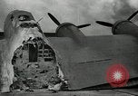 Standbild zerstörte Flugzeuge nach Angriff Pearl Harbor Hawaii USA, 1941, aus Sekunde 54 historischem Filmmaterial Videoclip 65675029980