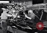 Immagine di Assemblare le parti di ricambio delle automobili Michigan United States USA, 1938, secondo 3 filmato di repertorio 65675029998