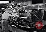 Immagine di Assemblare le parti di ricambio delle automobili Michigan United States USA, 1938, secondo 4 filmato di repertorio 65675029998