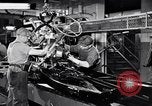 Immagine di Assemblare le parti di ricambio delle automobili Michigan United States USA, 1938, secondo 5 filmato di repertorio 65675029998