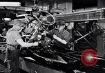 Immagine di Assemblare le parti di ricambio delle automobili Michigan United States USA, 1938, secondo 9 filmato di repertorio 65675029998