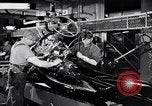 Immagine di Assemblare le parti di ricambio delle automobili Michigan United States USA, 1938, secondo 10 filmato di repertorio 65675029998