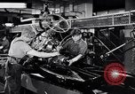Immagine di Assemblare le parti di ricambio delle automobili Michigan United States USA, 1938, secondo 11 filmato di repertorio 65675029998
