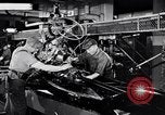 Immagine di Assemblare le parti di ricambio delle automobili Michigan United States USA, 1938, secondo 12 filmato di repertorio 65675029998