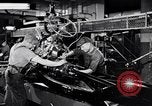 Immagine di Assemblare le parti di ricambio delle automobili Michigan United States USA, 1938, secondo 13 filmato di repertorio 65675029998