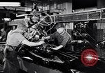 Immagine di Assemblare le parti di ricambio delle automobili Michigan United States USA, 1938, secondo 15 filmato di repertorio 65675029998