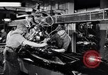 Immagine di Assemblare le parti di ricambio delle automobili Michigan United States USA, 1938, secondo 16 filmato di repertorio 65675029998