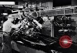 Immagine di Assemblare le parti di ricambio delle automobili Michigan United States USA, 1938, secondo 17 filmato di repertorio 65675029998