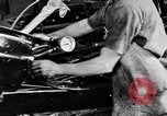 Immagine di Assemblare le parti di ricambio delle automobili Michigan United States USA, 1938, secondo 18 filmato di repertorio 65675029998