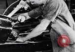 Immagine di Assemblare le parti di ricambio delle automobili Michigan United States USA, 1938, secondo 20 filmato di repertorio 65675029998