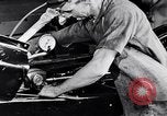 Immagine di Assemblare le parti di ricambio delle automobili Michigan United States USA, 1938, secondo 23 filmato di repertorio 65675029998