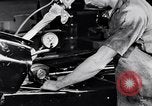 Immagine di Assemblare le parti di ricambio delle automobili Michigan United States USA, 1938, secondo 25 filmato di repertorio 65675029998