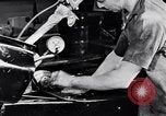 Immagine di Assemblare le parti di ricambio delle automobili Michigan United States USA, 1938, secondo 26 filmato di repertorio 65675029998