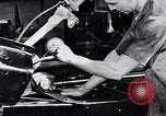 Immagine di Assemblare le parti di ricambio delle automobili Michigan United States USA, 1938, secondo 28 filmato di repertorio 65675029998
