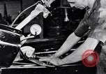 Immagine di Assemblare le parti di ricambio delle automobili Michigan United States USA, 1938, secondo 29 filmato di repertorio 65675029998