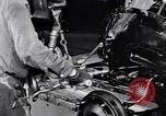 Immagine di Assemblare le parti di ricambio delle automobili Michigan United States USA, 1938, secondo 31 filmato di repertorio 65675029998
