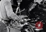 Immagine di Assemblare le parti di ricambio delle automobili Michigan United States USA, 1938, secondo 32 filmato di repertorio 65675029998