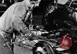 Immagine di Assemblare le parti di ricambio delle automobili Michigan United States USA, 1938, secondo 34 filmato di repertorio 65675029998