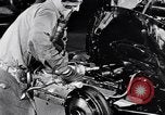 Immagine di Assemblare le parti di ricambio delle automobili Michigan United States USA, 1938, secondo 36 filmato di repertorio 65675029998