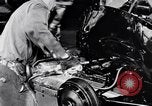 Immagine di Assemblare le parti di ricambio delle automobili Michigan United States USA, 1938, secondo 37 filmato di repertorio 65675029998