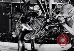 Immagine di Assemblare le parti di ricambio delle automobili Michigan United States USA, 1938, secondo 43 filmato di repertorio 65675029998