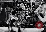 Immagine di Assemblare le parti di ricambio delle automobili Michigan United States USA, 1938, secondo 45 filmato di repertorio 65675029998