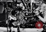 Immagine di Assemblare le parti di ricambio delle automobili Michigan United States USA, 1938, secondo 46 filmato di repertorio 65675029998