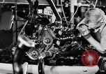 Immagine di Assemblare le parti di ricambio delle automobili Michigan United States USA, 1938, secondo 47 filmato di repertorio 65675029998