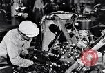 Immagine di Assemblare le parti di ricambio delle automobili Michigan United States USA, 1938, secondo 54 filmato di repertorio 65675029998