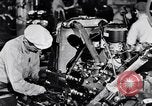 Immagine di Assemblare le parti di ricambio delle automobili Michigan United States USA, 1938, secondo 56 filmato di repertorio 65675029998