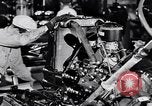 Immagine di Assemblare le parti di ricambio delle automobili Michigan United States USA, 1938, secondo 58 filmato di repertorio 65675029998
