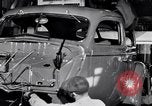 Immagine di Assemblare le parti di ricambio delle automobili Michigan United States USA, 1938, secondo 59 filmato di repertorio 65675029998