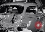 Immagine di Assemblare le parti di ricambio delle automobili Michigan United States USA, 1938, secondo 60 filmato di repertorio 65675029998