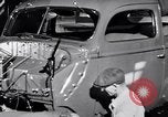 Immagine di Assemblare le parti di ricambio delle automobili Michigan United States USA, 1938, secondo 62 filmato di repertorio 65675029998