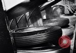 Image of tire production Michigan United States USA, 1938, second 51 stock footage video 65675030008