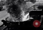 Image of molten steel poured into engine block molds Michigan United States USA, 1938, second 22 stock footage video 65675030010