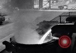 Image of molten steel poured into engine block molds Michigan United States USA, 1938, second 27 stock footage video 65675030010