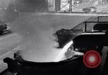 Image of molten steel poured into engine block molds Michigan United States USA, 1938, second 28 stock footage video 65675030010