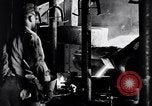 Image of molten steel poured into engine block molds Michigan United States USA, 1938, second 44 stock footage video 65675030010