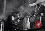 Image of molten steel poured into engine block molds Michigan United States USA, 1938, second 47 stock footage video 65675030010